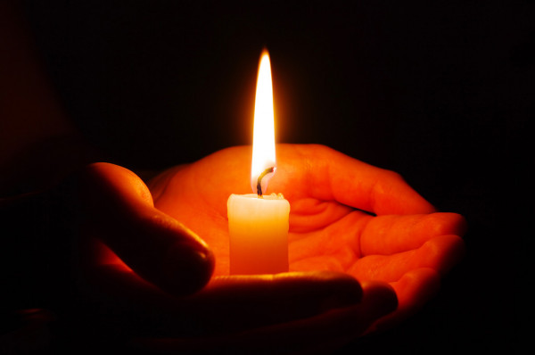 depositphotos_7301433-stock-photo-candle-in-a-hand.jpg
